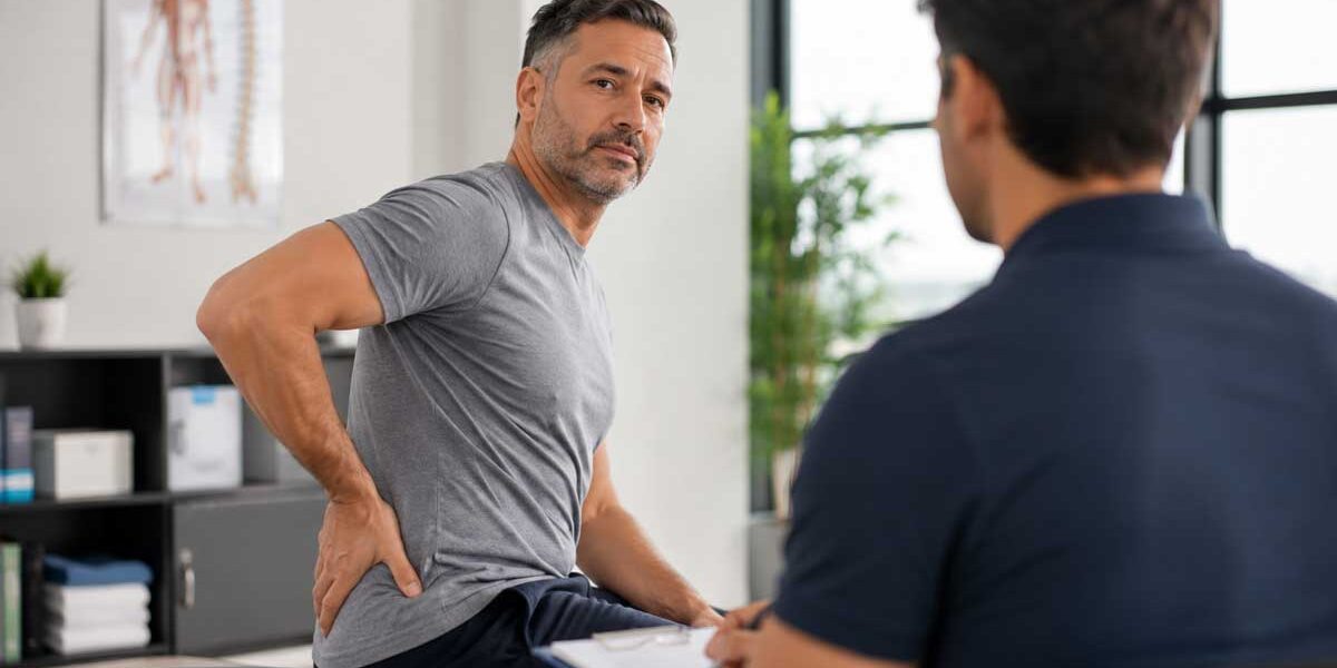 Patient-discussing-back-hip-and-leg-pain-with-a-wellness-provider-in-Glenelg-MD Patient discussing back hip and leg pain with a wellness provider in Glenelg MD